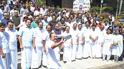 Chief Minister V D Satheesan taking a selfie with his cabinet colleagues after the conclusion of the two-day Re-Imagining Kerala Conclave at IIM, Kozhikode, on Saturday.