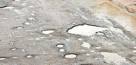 Activists protest pothole-ridden Karimnagar road