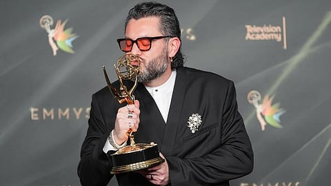 Miguel Gandelman poses in the press room with the award for outstanding music direction for "The Apple Music Super Bowl LX Halftime Show Starring Bad Bunny" during night one of the Creative Arts Emmy Awards on Saturday, Sept. 5, 2026, in Los Angeles.