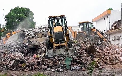  Local Authorites carry out demolition of illegal construction at Collectorate premises, in Saharanpur on Saturday.