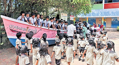 Students of Beemapally Government UP School, Thiruvananthapuram, in and around the ‘Vayanathoni’ placed on the school ground 