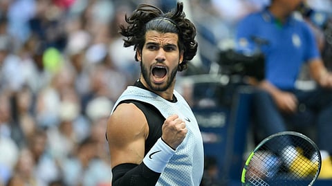 Spain's Carlos Alcaraz reacts as he plays USA's Tommy Paul in their men's singles round of 16 tennis match on day eight of the US Open tennis tournament on September 6, 2026.