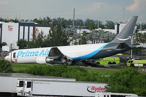 An Amazon cargo plane sits at the Miami International Airport (MIA) after it overshot the runway, Sunday, Sept. 6, 2026.