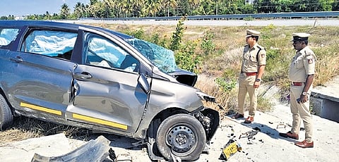 The mangled remains of the car near Doddakari on Monday 
