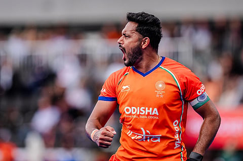 Harmanpreet Singh celebrates after scoring a goal at the World Cup last month. Singh and his colleagues wore saffron jerseys 