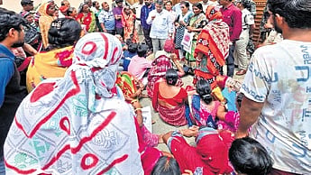 Affected families staging a dharna in front of the DRDA office 