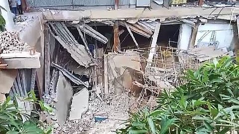Sources said the approach road above as well as the basement and its structural steel columns caved in. 