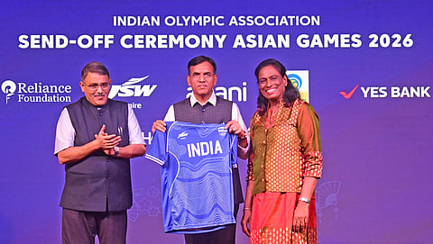 Sports minister Mansukh Mandaviya (C) and Indian Olympic Association president PT Usha (R) during the Asian Games send-off ceremony in New Delhi on Tuesday 