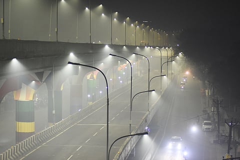 Thick smog caused by pollution envelops the city after Bhogi celebrations, severely reducing visibility for motorists. Smog witnessed at Velachery flyover.