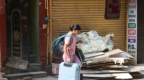 Students vacate rooms near the collapsed building 