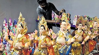 An artisan with idols