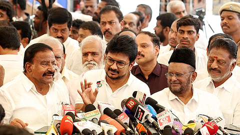 Opposition leader Udhayanidhi Stalin addresses media persons after walking out of the Assembly along with his party members on Monday.