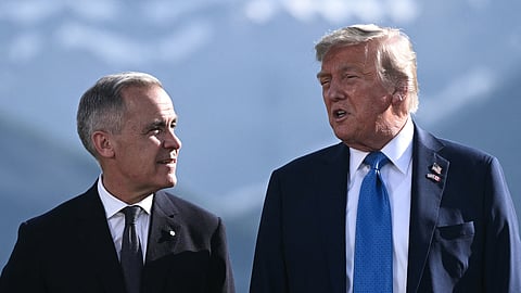 Canada Prime Minister Mark Carney (L) and US President Donald Trump.