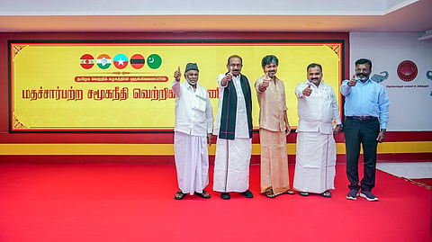 Tamil Nadu Chief Minister C Joseph Vijay, with alliance members, shows a victory sign as he announces the TVK-led alliance’s new name at the party headquarters in Chennai on Wednesday, Sept. 09, 2026.