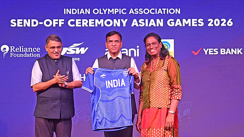 Union Sports Minister Mansukh L. Mandaviya (C) with IOA chief PT Usha