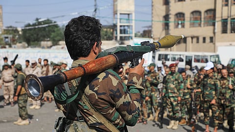 A fighter with Yemen’s Houthi rebels carries a rocket-propelled grenade launcher as they march during a mobilisation campaign in Sanaa, Yemen, Thursday, Sept. 10, 2026.