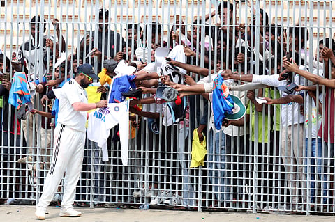 Mohammed Shami signs autographs for fans during the Duleep Trophy final at the MA Chidambaram Stadium
