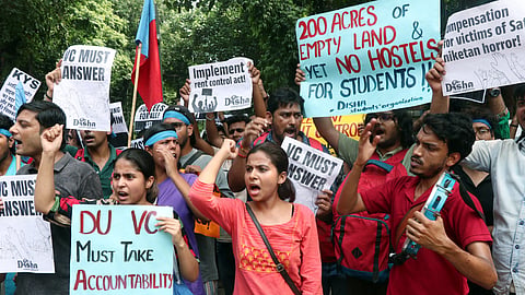 Students Organisation stage a protest to condemn the PG building collapse incident at Satya Niketan that claimed 6 lives at Delhi University North Campus, in New Delhi on Monday.