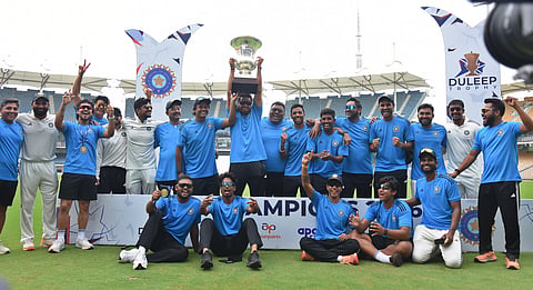 East Zone team and support  staff celebrate with the trophy