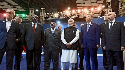 : Iranian President Masoud Pezeshkian, South African President Cyril Ramaphosa, Indonesian President Prabowo Subianto, Indian Prime Minister Narendra Modi, Chinese President Xi Jinping, Russian President Vladimir Putin, pose for a photo at the exhibition of the "Innovative India" dedicated to the 20th anniversary of the BRICS in New Delhi, India, on Saturday, Sept. 12, 2026. 