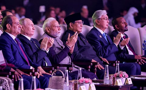 Prime Minister Narendra Modi with Russian President Vladimir Putin, Indonesian President Prabowo Subianto, Ethiopian Prime Minister Abiy Ahmed Ali, Kazakhstan President Kassym-Jomart Tokayev, and others, during a Gala dinner hosted by PM Modi for visiting leaders of the 18th BRICS Summit, in New Delhi.
