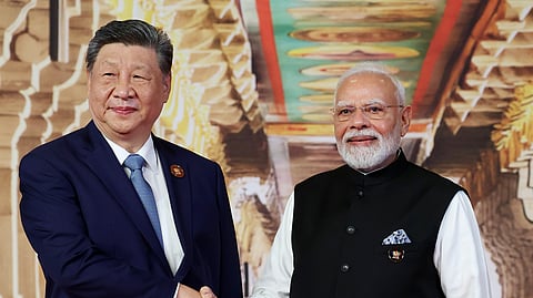 Prime Minister Narendra Modi and Chinese President Xi Jinping exchange a handshake during the 18th BRICS Summit 2026 at Bharat Mandapam, in New Delhi on Saturday.