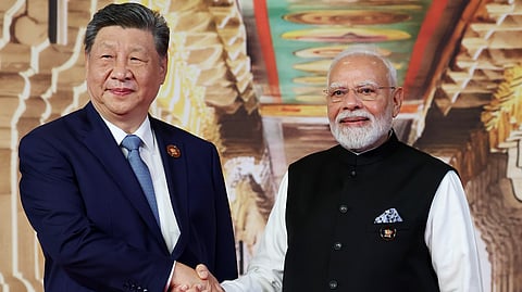 Prime Minister Narendra Modi and Chinese President Xi Jinping exchange a handshake during the 18th BRICS Summit 2026 at Bharat Mandapam, in New Delhi on Saturday.