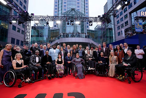 Cast and crew arrive on the red carpet to promote the film Being Heumann at the Toronto International Film Festival, in Toronto, Thursday, Sept. 10, 2026. 