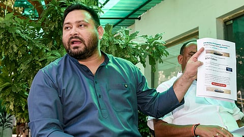 Rashtriya Janata Dal (RJD) leader Tejashwi Yadav addresses a press conference at his residence, in Patna, Bihar, Sunday, Sept. 13, 2026.