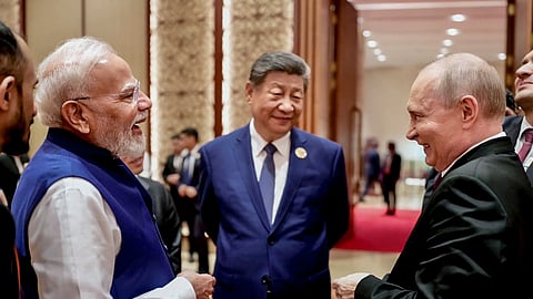 Prime Minister Narendra Modi with Russian President Vladimir Putin and Chinese President Xi Jinping on the sidelines of the 18th BRICS Summit, in New Delhi.
