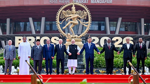 From left, Brazil's Foreign Minister Mauro Vieira, Abu Dhabi Crown Prince Sheikh Khaled bin Mohamed bin Zayed Al Nahyan, Indonesian President Prabowo Subianto, Egyptian President Abdel Fattah el-Sisi, Russian President Vladimir Putin, Prime Minister Narendra Modi, Chinese President Xi Jinping, South African President Cyril Ramaphosa, Iranian President Masoud Pezeshkian and Ethiopian Prime Minister Abiy Ahmed Ali pose for a group photograph amid the ongoing 18th BRICS Summit, at the Bharat Mandapam, in New Delhi. 