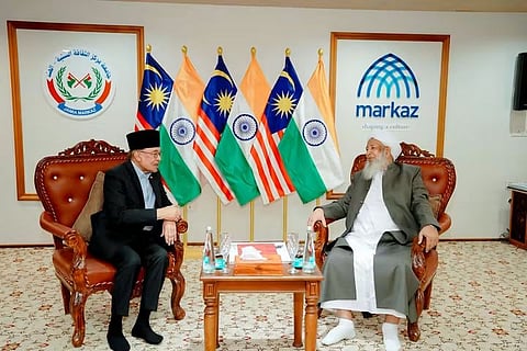 Malaysian opposition leader Anwar Ibrahim with prominent Sunni scholar and Indian Grand Mufti Kanthapuram A P Aboobacker Musliyar