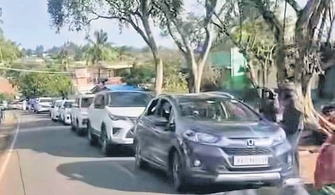 Vehicles lined up on Kalhatty Ghat Road during festival rush on Sunday  