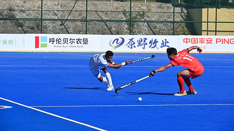 Players in action during the final on Sunday
