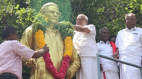 CPM General Secretary MA Baby garlanding the statue of P. Ramamoorthy, one of the party's founding leaders in Madurai.