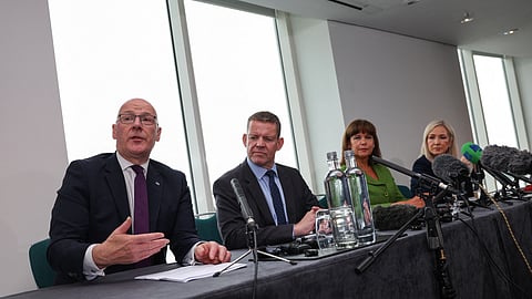 Scottish Nationalist Party (SNP) leader John Swinney (L) speaks as (2nd L to R) Rhun ap Iorwerth of Plaid Cymru in Wales, Mary Lou McDonald, president of Irish Republicans Sinn Fein, and Michelle O'Neill, vice president of Irish Republicans Sinn Fein, look on as they attend a meeting in Cardiff, Wales, on September 14, 2026, to press for self-determination votes in their territories.
