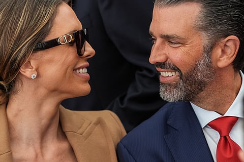 Donald Trump Jr. and his wife Bettina Anderson look at each other while waiting for President Donald Trump to speak at Deerfield Residence, the residence of the U.S. Ambassador to Ireland Edward S. Walsh, Saturday, Sept. 12, 2026, in Dublin.