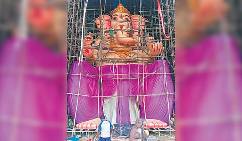 The 62-feet tall idol of Lord Ganesh in making at Tinigharia in Cuttack.