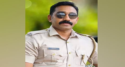 A police officer has been booked for stealing seven sacks of banned tobacco products that had been seized by the police.