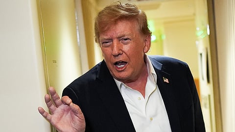 US President Donald Trump speaks with reporters while in flight on Air Force One from Shannon, Ireland, to Joint Base Andrews, Md., Sunday, Sept. 13, 2026.