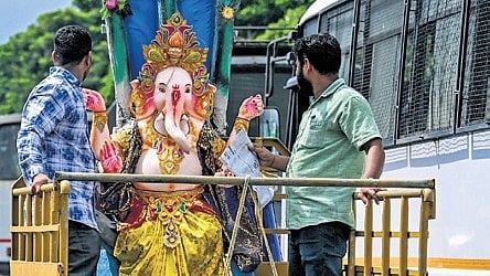 A Ganesh Idol being taken on a pickup van in Bhubaneswar.
