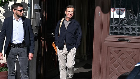 Swedish Prime Minister Ulf Kristersson leaves the official residence, Sager House, in Stockholm, a day after the vote in a general election, Monday, Sept. 14, 2026.