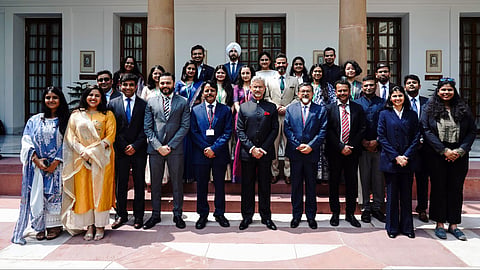 External Affairs Minister S. Jaishankar poses for a photo with the team of the Ministry of External Affairs (MEA) who contributed to organising the 18th BRICS Leaders’ Summit 2026, in New Delhi on Monday.