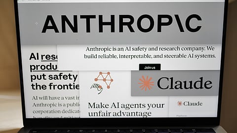 Pages from the Anthropic website and the company's logos are displayed on a computer screen in New York, Feb. 26, 2026.