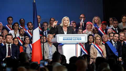 French far-right leader Marine Le Pen delivers her speech, Sunday, Sept. 13, 2026, in Henin-Beaumont, northern France.