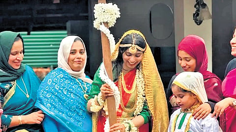 Brides are swapping contemporary wedding outfits for simple silk saris, kachi and thattam.