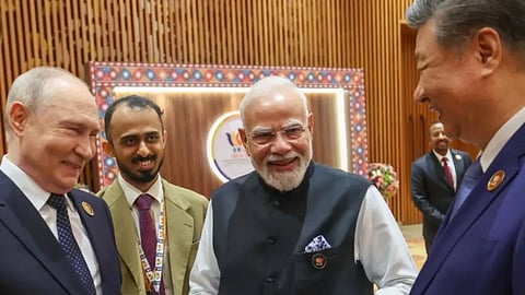 36-year-old Sidharth Babu, a 2017-batch Indian Foreign Service officer from Kaloor, Kochi with Prime Minister Narendra Modi, Chinese President Xi Jinping and Russian President Vladimir Putin during the BRICS summit in New Delhi