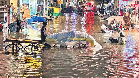 Seppings Road in Shivajinagar was inundated during heavy rain on Tuesday. 
