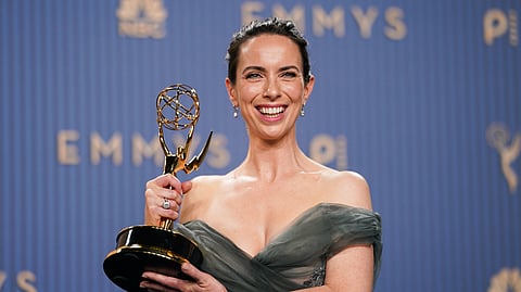 Kate O'Flynn poses in the press room with the award for outstanding supporting actress in a comedy series for "Widow's Bay" during the 78th Emmy Awards on Monday, Sept. 14, 2026, at the JW Marriott in Los Angeles.