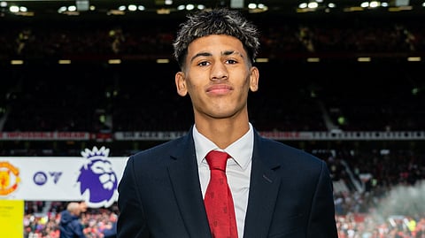 Manchester United U-18s footballer JJ Gabriel poses at the club's Old Trafford Stadium.